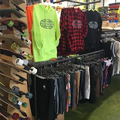Inside the Boardgarden Napa storefront: custom apparel and boards
